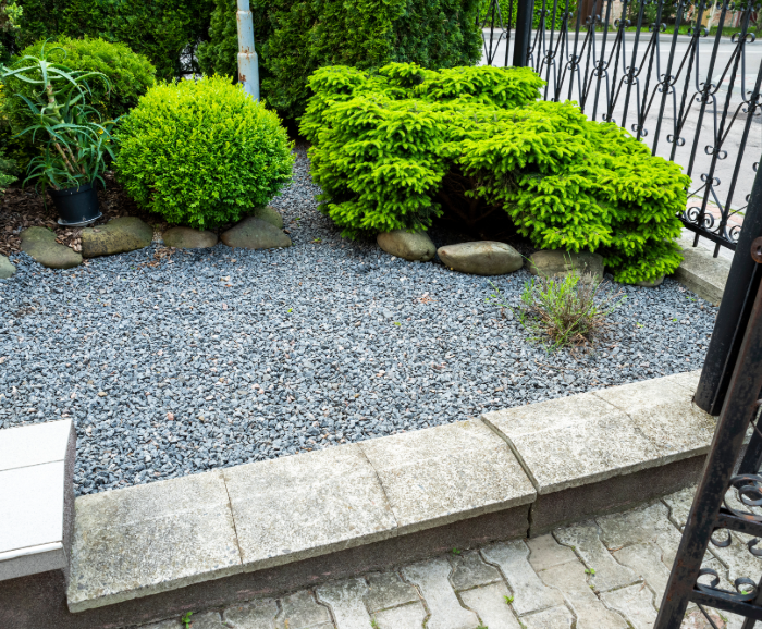 spreading rock mulch